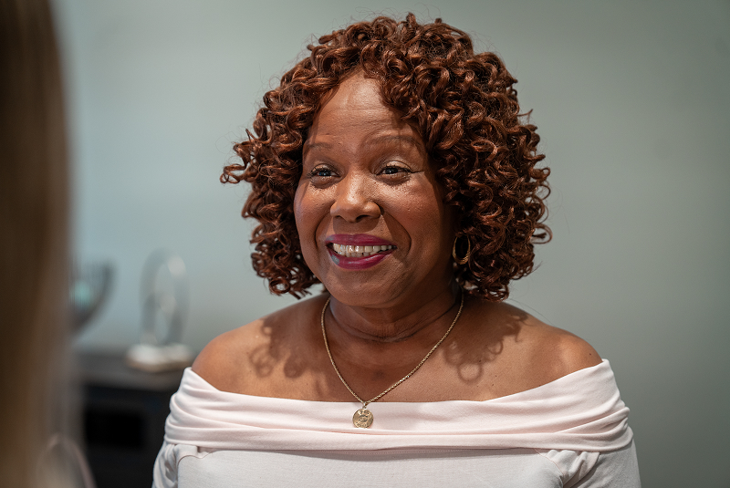 norma smiling at staff