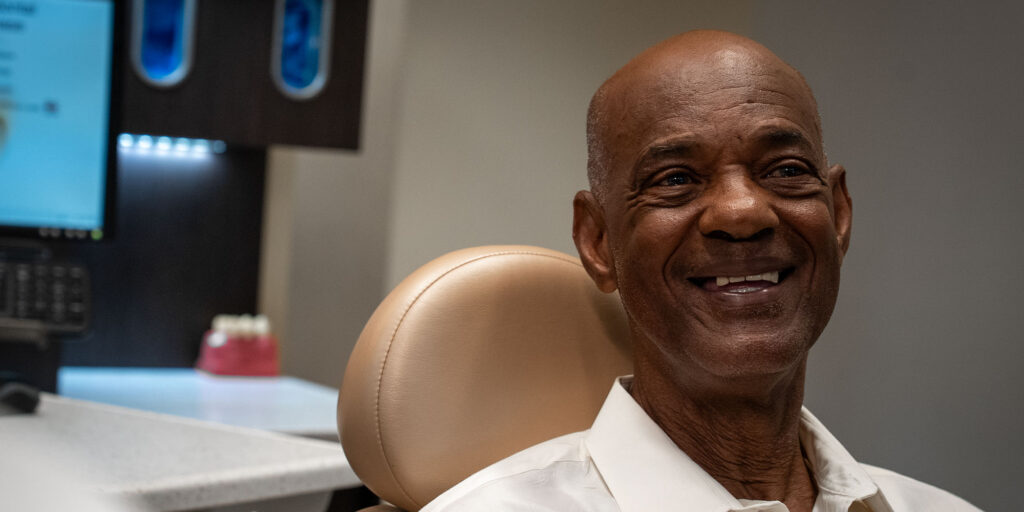 man during his dental implant treatment