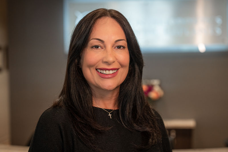 smiling woman dental implants